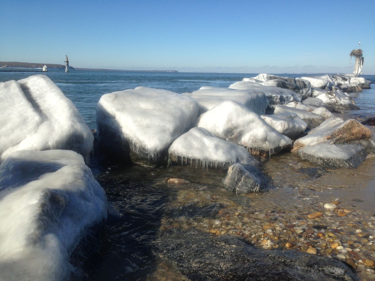 frozen rocks (by the channel entrance to 3 Mile Harbor)